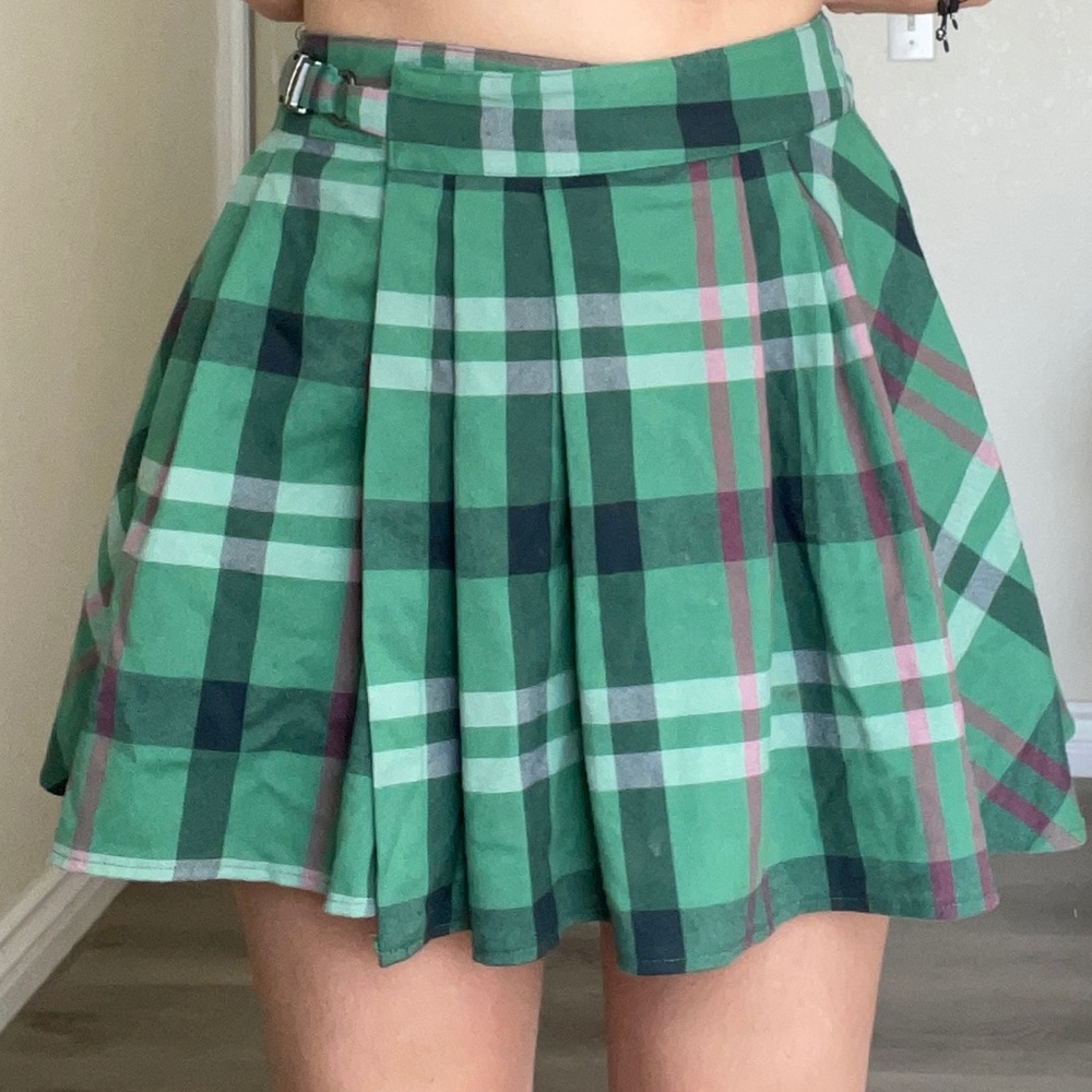 Cute green plaid Urban Outfitters miniskirt with buckle. Never worn